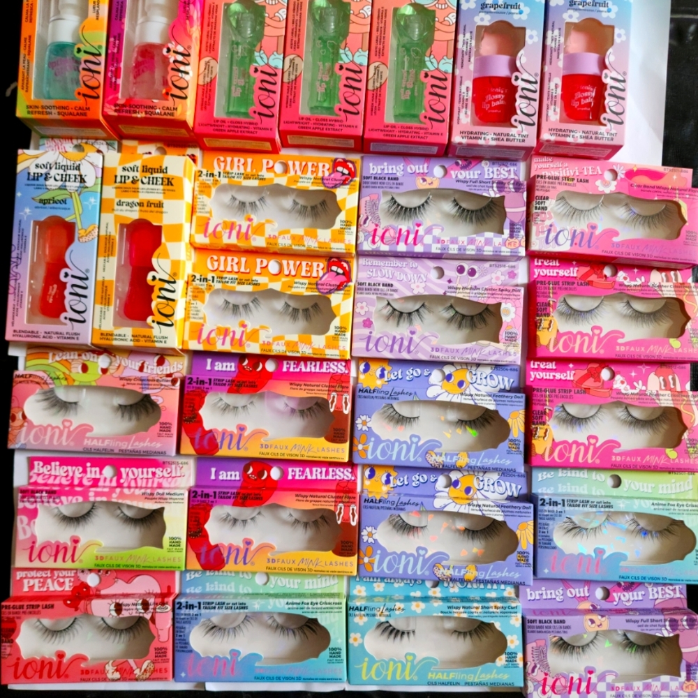 27 piece lot of ioni glow getter skin, lip gloss, lip balm, and eye lash NEW HTF